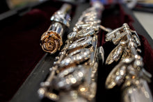 Polished Bronze Rose design flute crown on a silver flute